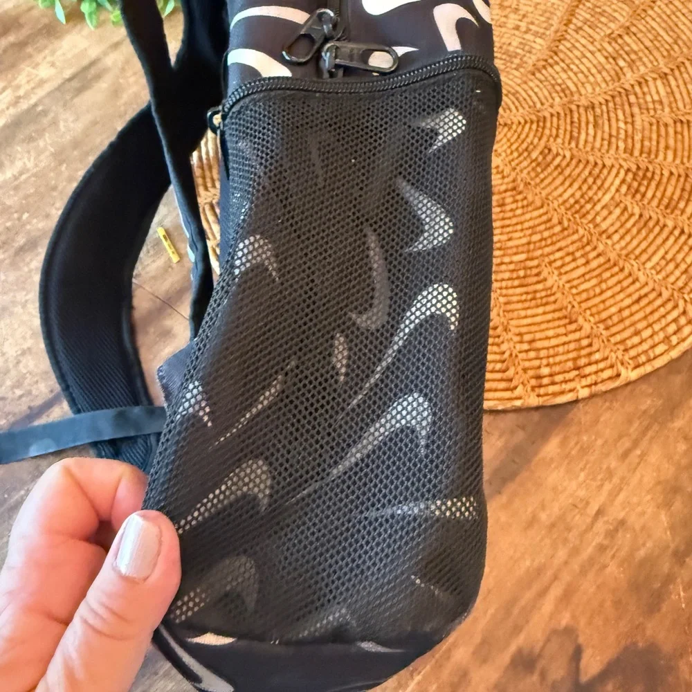 Nike Black and Gray Swoosh Logo Pattern Backpack